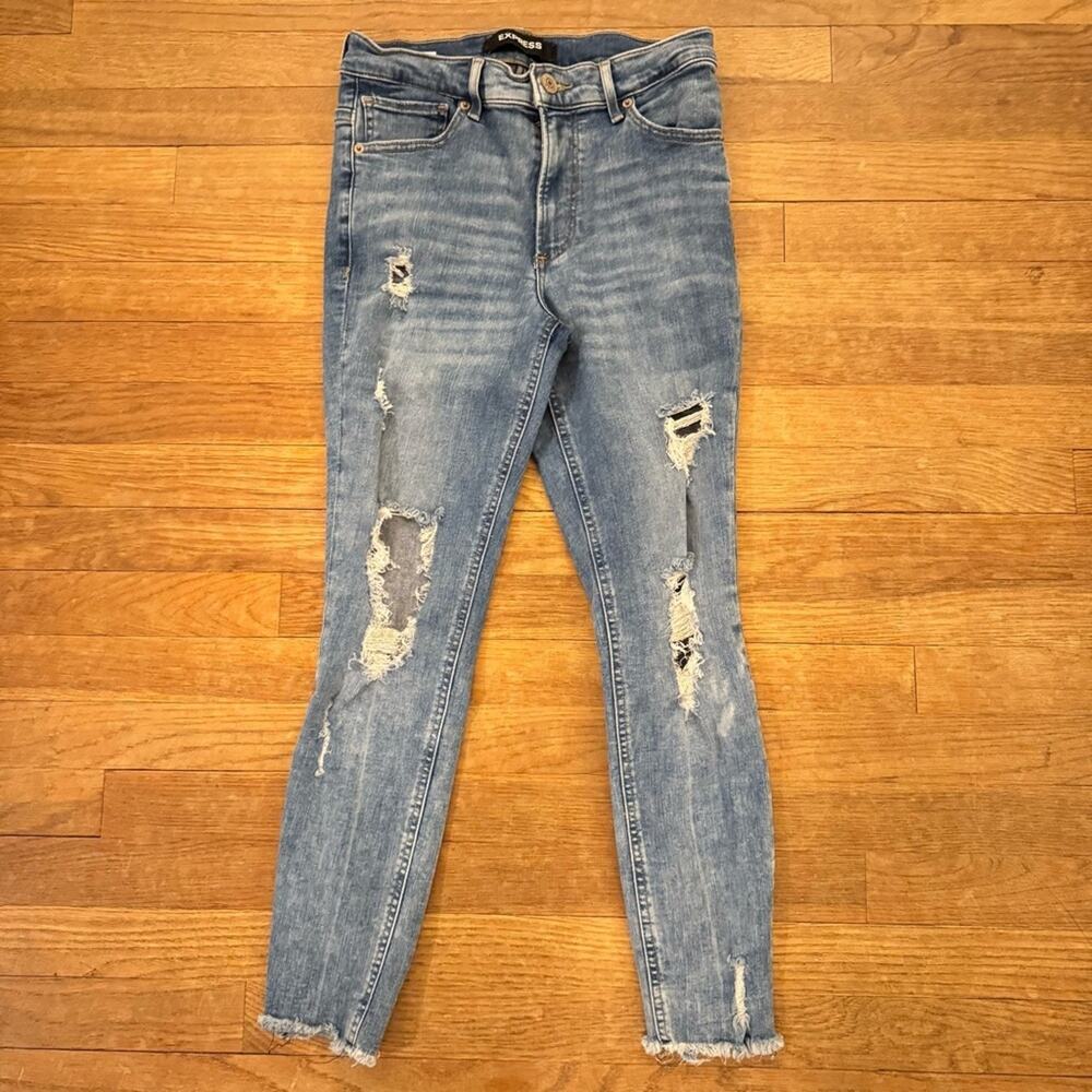 Express distressed medium wash high rise ankle jeggings size 6
b11
